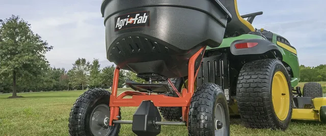 Agri-Fab Pull Behind Broadcast Spreader for Seed, Fertilizer, Salt and Ice Melt, 130 lb Hopper Capacity with Universal Hitch and 12 Ft Spread Width | product view