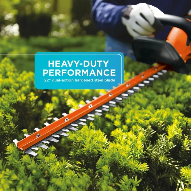 A closeup of the BLACK+DECKER 20V MAX* 22-in. Cordless Hedge Trimmer. Heavy-duty performance. 22-in. dual-action hardened steel blade.