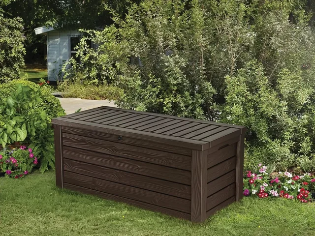 Keter Westwood 150-gallon deck box, brown, an example of garden tool storage