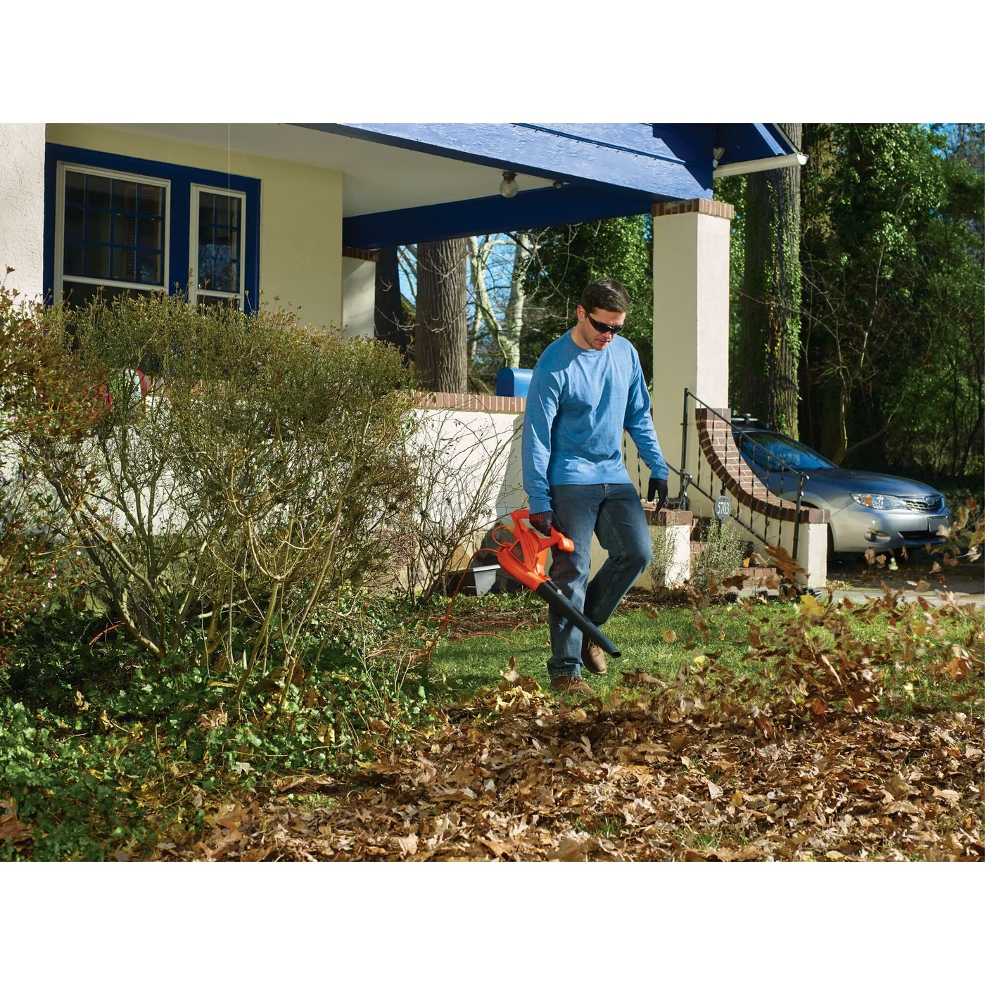 7 Amp Blower being used by a person outdoors.