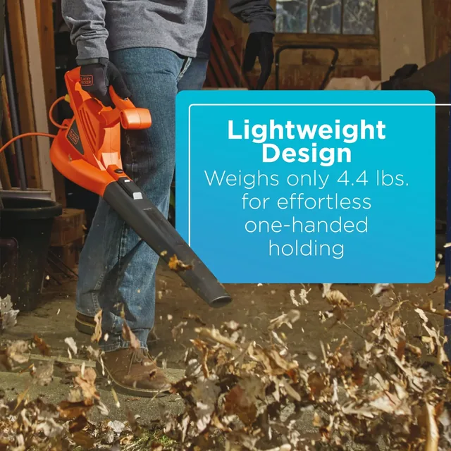 A person clears leaves with the BLACK+DECKER 7-Amp Electric Leaf Blower. Lightweight design. Weighs only 4.4 lbs. for effortless, one-handed holding.