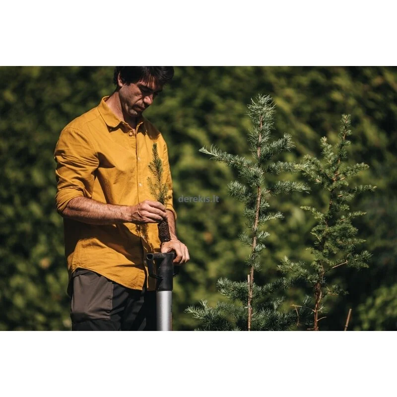 Fiskars Xact bulb planter used while planting a young tree