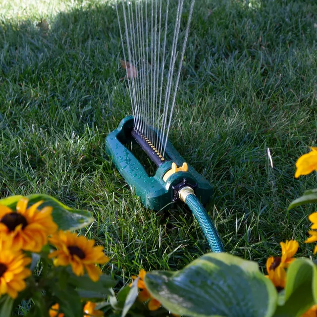 Melnor 65148AMZ sixteen-nozzle oscillating sprinkler, detail or garden-use view 2