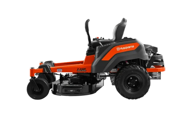 Husqvarna Z242F Special Edition. Side view of a Husqvarna zero-turn mower with visible cutting deck.