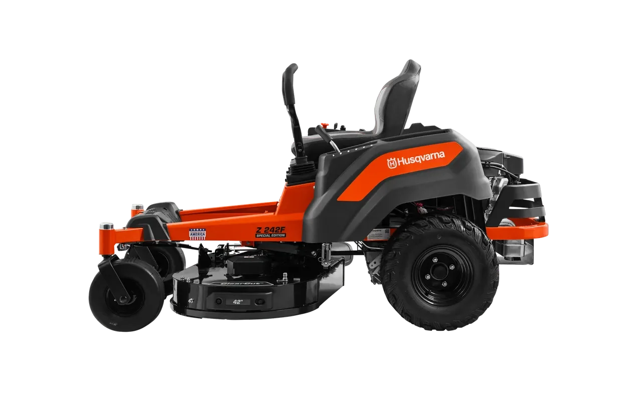 Husqvarna Z242F Special Edition. Side view of a Husqvarna zero-turn mower with visible cutting deck.