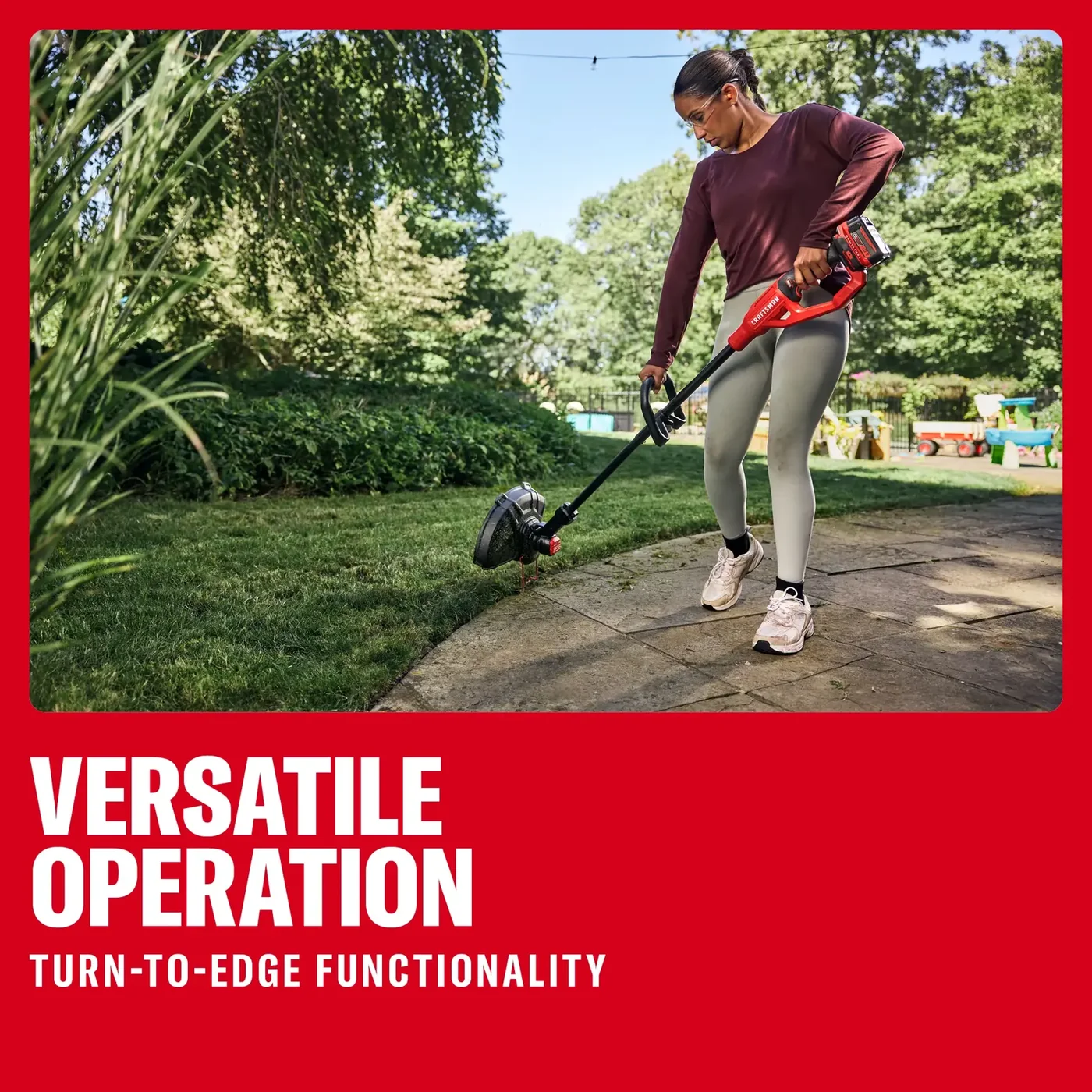Photo of person using Craftsman cordless string trimmer CMCST901M1 edging lawn next to a stone path outdoors.