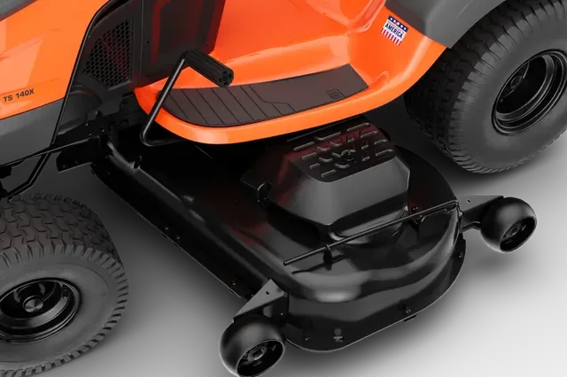 Top view of a ride-on mower showing the seat and cutting deck.